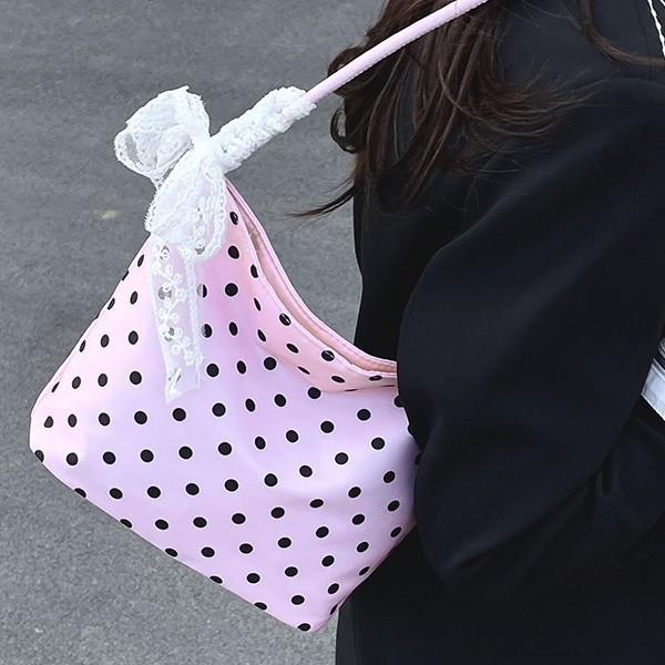 A niche design polka dot canvas bag for women, a new summer single-shoulder bag in 2025, is a super popular casual bucket bag full figure