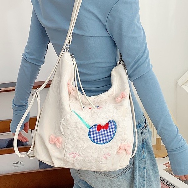 A new large-capacity plush cartoon fresh backpack for cute girls and a trendy multi-functional commuting crossbody bag full figure