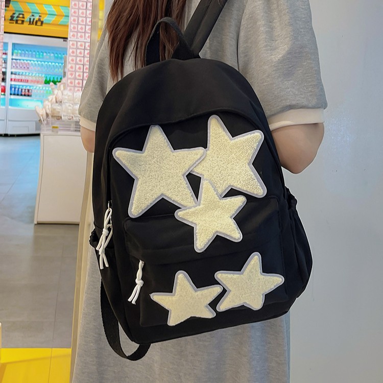 2025 New large-capacity student bag, high appearance level, five-pointed star schoolbag, simple and fashionable computer bag, backpack, cross-border full figure