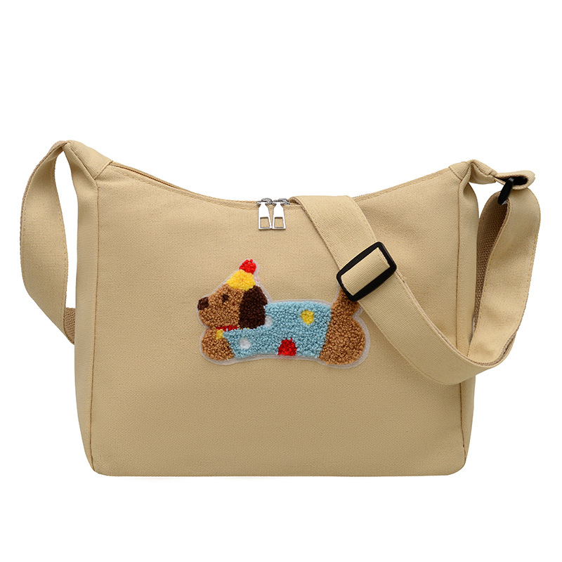 The new trendy and niche casual cartoon dog tote bag is a versatile women's commuter crossbody bag with a strong sense of design Item Picture