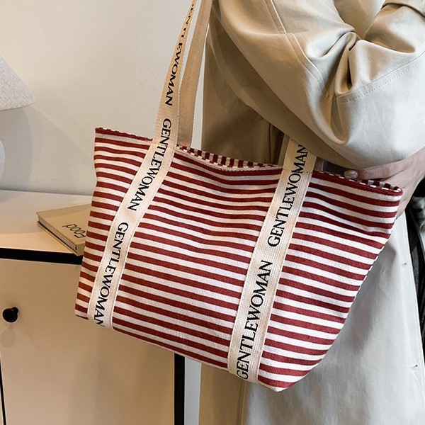 New striped large-capacity handbag, versatile new tote bag, portable handbag for going out, autumn and winter bag details Picture