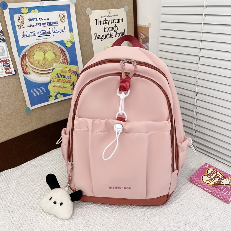 New simple backpack travel and study bags for children in grades one, two and three to protect the spine and reduce the burden full figure