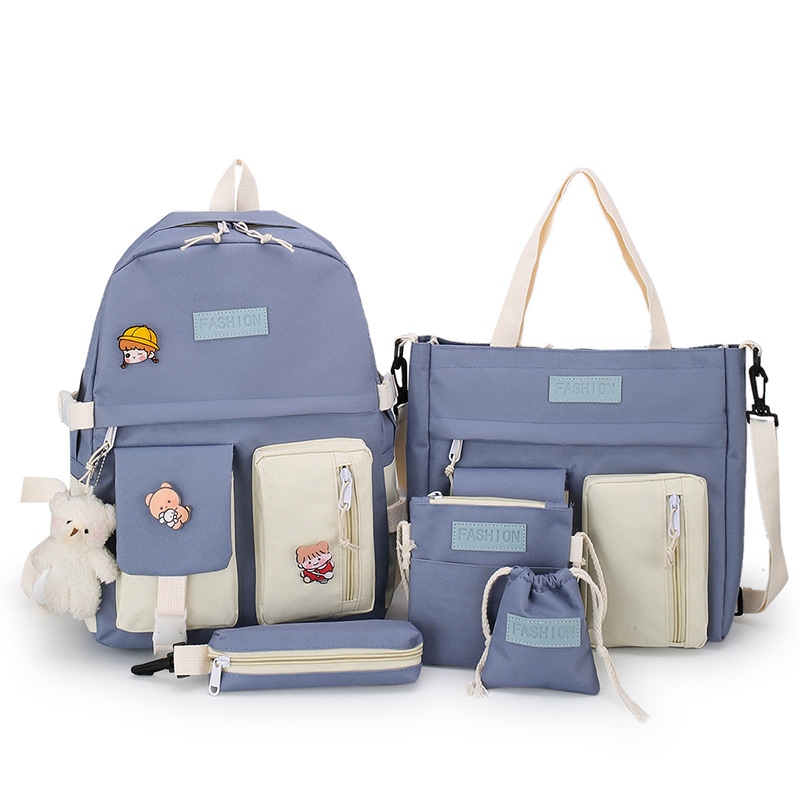 A new Korean-style canvas five-piece backpack for girls, a hand-held schoolbag for grade 34, 56 primary school students Item Picture