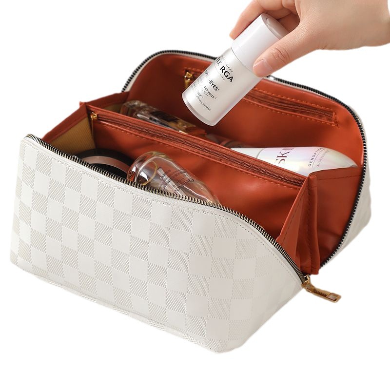 Pillow makeup bag, women's portable large-capacity makeup products storage bag, high appearance level, travel and outing hand-held toiletries bag Item Picture