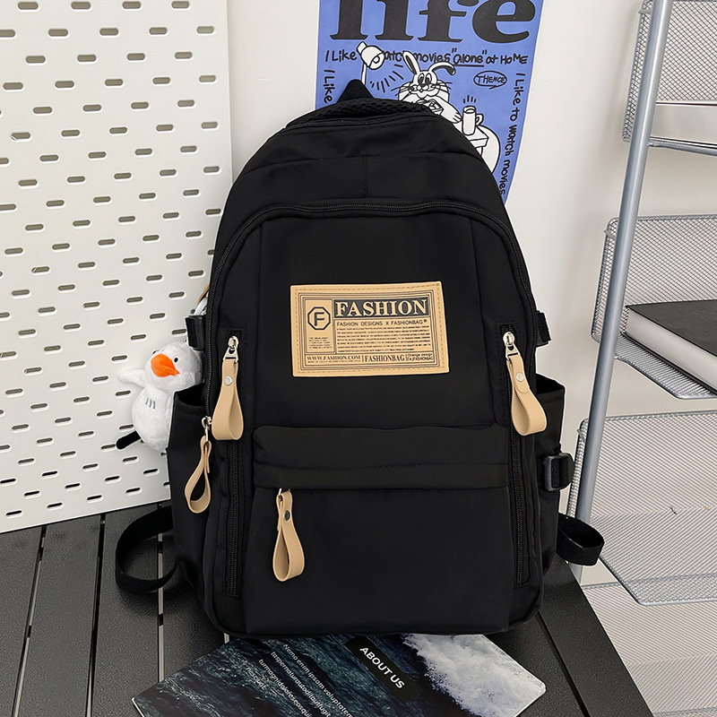 New Korean version 2025 schoolbag for junior high school students, simple and fashionable, large-capacity female backpack for college students details Picture