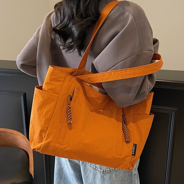 New cross-border solid-color canvas bag, women's large-capacity single-shoulder bag, 2025 new student versatile tote bag, handbag Application Scenario