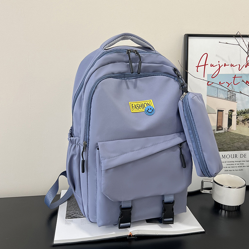 A new English-embroidered Korean version of a large-capacity student bag for 2025, fashionable and trendy, versatile backpack for commuting Application Scenario