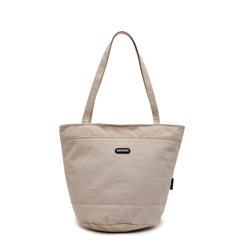 Lazy style large-capacity canvas bag for women, new 2025 Korean fashion handbag, versatile commuting bucket tote bag Item Picture