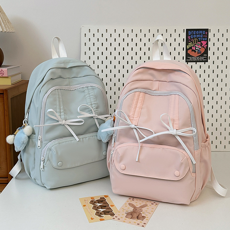 Schoolbag for junior high school girls, Korean style, fashionable, niche design sense, large-capacity backpack, lightweight, new college student backpack full figure