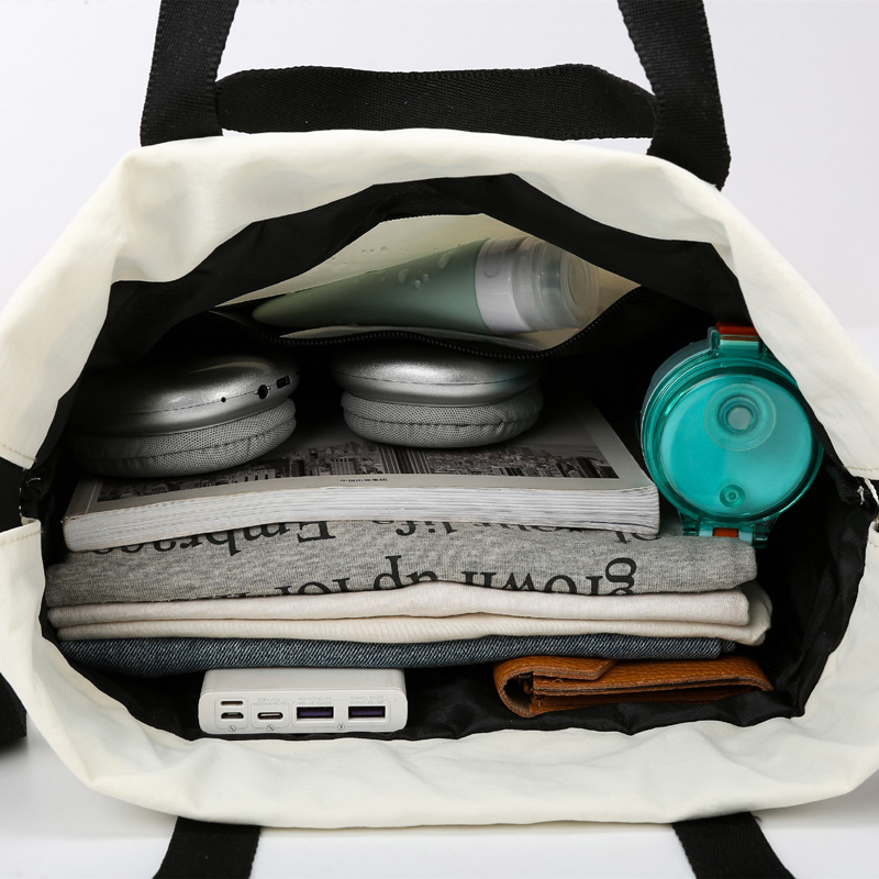 The new multi-functional portable drawstring storage bag is fashionable, simple and versatile. It is a fitness bag and a lightweight, large-capacity travel backpack details Picture