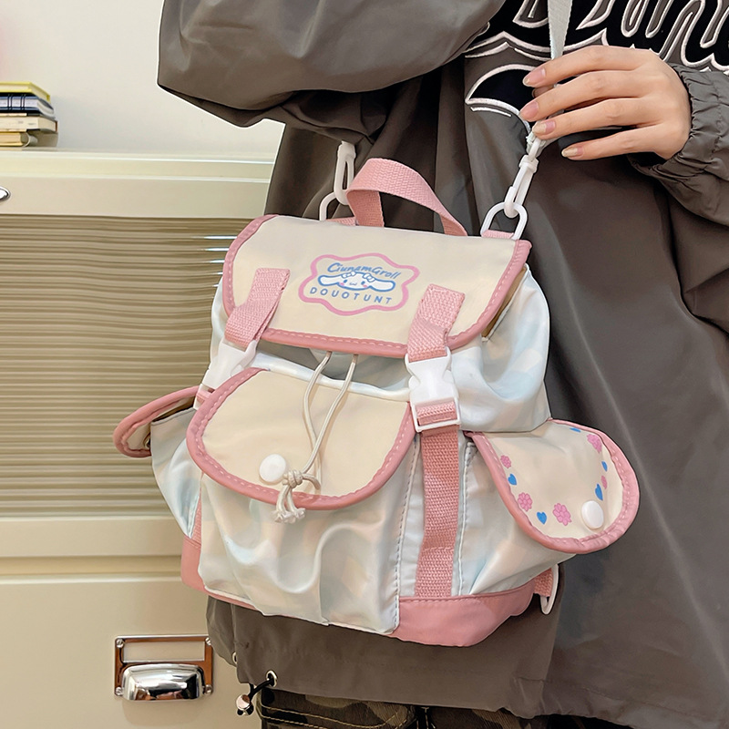 The new Korean donut big ear collaboration backpack, primary school schoolbag, girls' crossbody bag, and mini bag of cinnamon dog Application Scenario