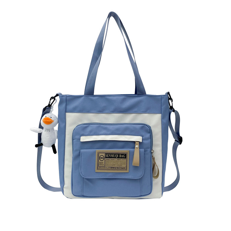New large-capacity canvas bag for after-school tutoring, dual-purpose handbag, girls' schoolbag, canvas crossbody bag for junior high school and senior high school students Item Picture
