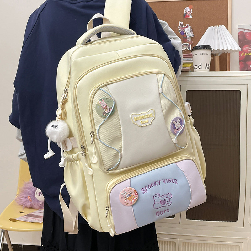 A large-capacity schoolbag in the style of a girls' academy, a lightweight and versatile forest-themed backpack for junior high school students in the Korean style of Instagram, and a travel backpack details Picture