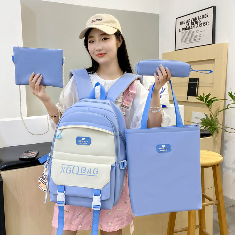 Large-capacity junior high school backpack, four-piece set of schoolbags for students in grades three to six, fresh and versatile tutorial backpack full figure