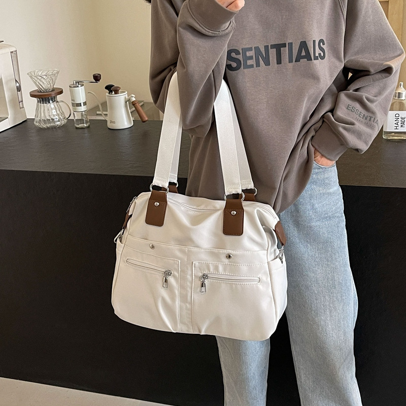 Large-capacity fashionable commuter tote bag 2025 new style canvas versatile shoulder bag trendy casual travel handbag details Picture