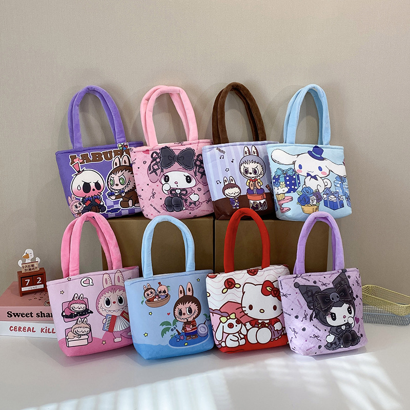 A new cartoon multi-pattern printed handbag with a Japanese girl's heart, a hand-held storage bag with a zipper full figure