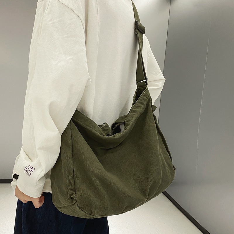 Japanese crossbody bag with artistic style, canvas bag for women 2024 new model, large capacity, solid color, simple hand-held shoulder bag for women full figure