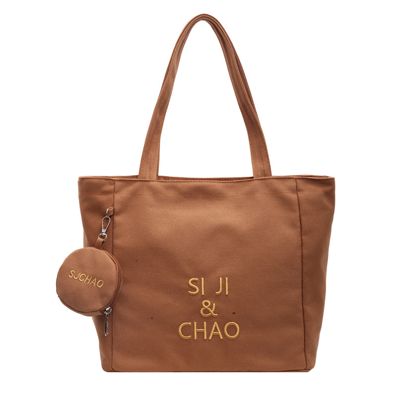 Large-capacity class single-shoulder commuting versatile bag, tutorial bag, hand-held canvas bag, student tutorial and work commuting bag Item Picture