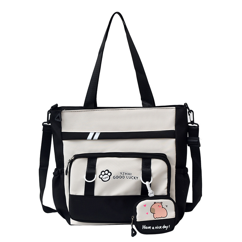 2025 New Korean version large-capacity junior high school girl heart student schoolbag, casual and simple travel tutorial bag for girls, crossbody bag Item Picture