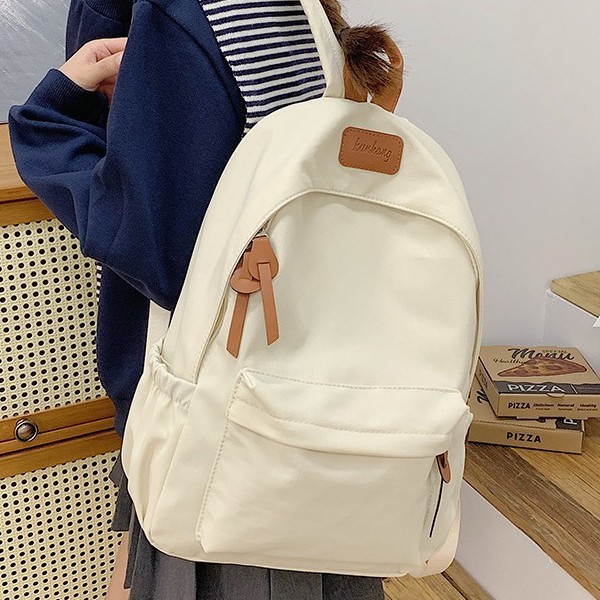 Large-capacity high school niche Instagram versatile schoolbag, student female trend travel backpack, 2024 new backpack, solid color backpack full figure
