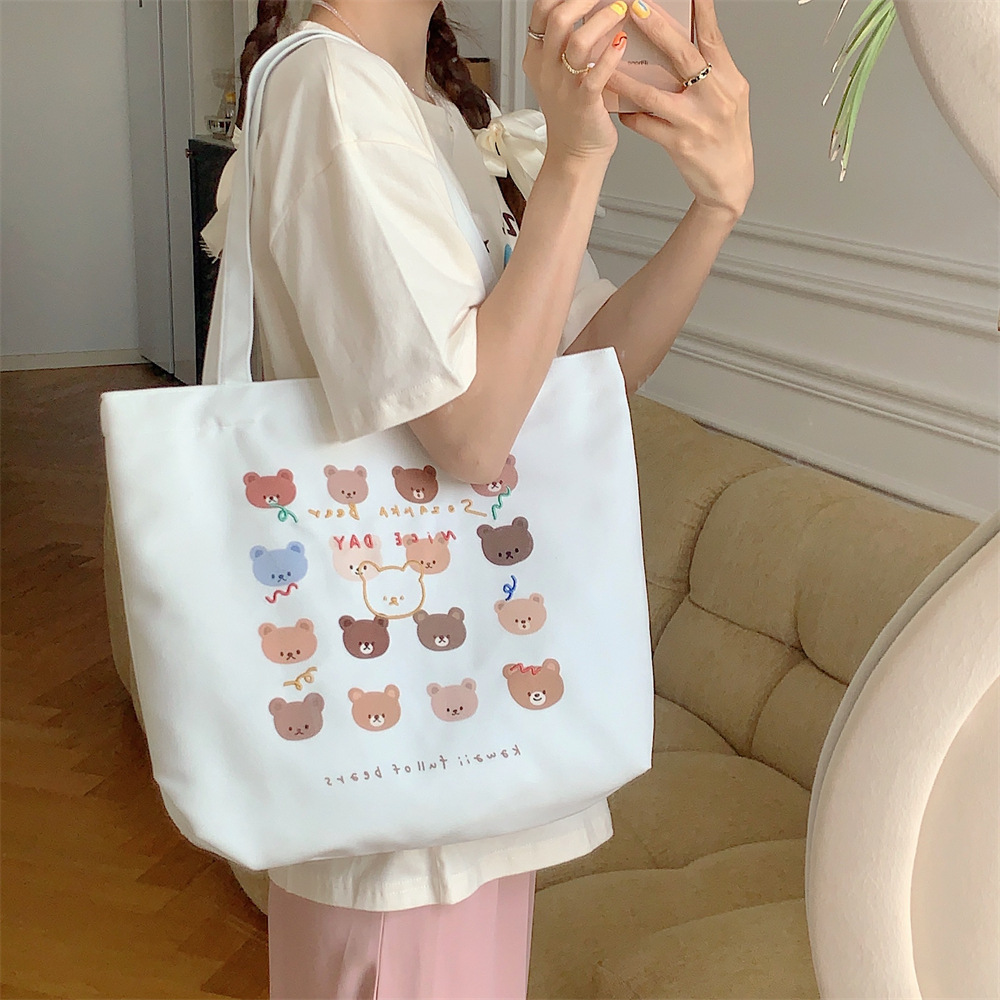 3854 large-capacity tote bag for women, 2023 new trendy cartoon bear print shopping bag, single-shoulder bag, canvas bag Application Scenario