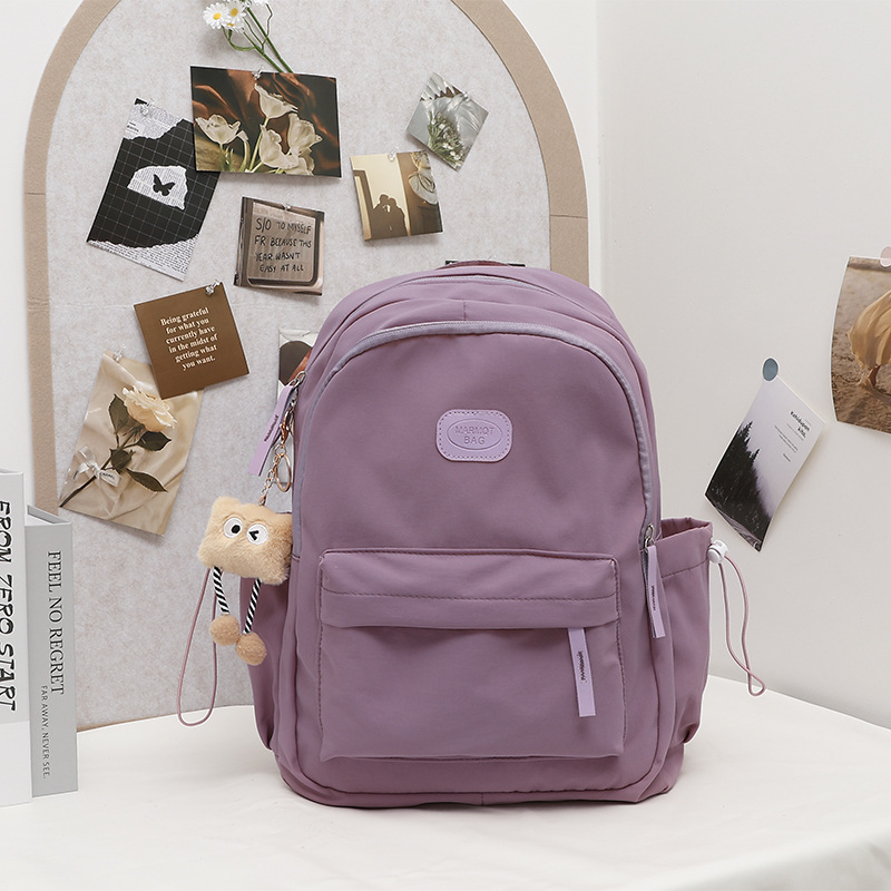 Simple and versatile schoolbag for junior high school girls 2025, fashionable backpack for niche high school and primary school students, travel backpack trend details Picture