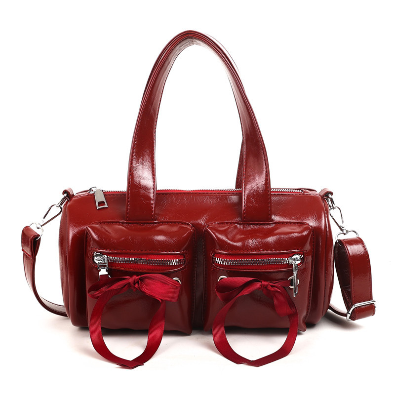 Korean-style bow hand-held bag with a girlish texture, retro and versatile baguette bag, a niche, simple and lightweight single-shoulder crossbody bag, trendy Item Picture