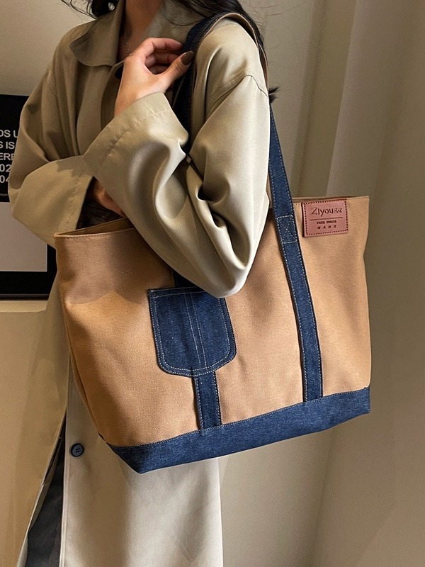 A new large-capacity tote bag for women, a color-blocking canvas bag, a casual and simple hand-held shoulder bag, and a fashionable underarm bag Specification drawing