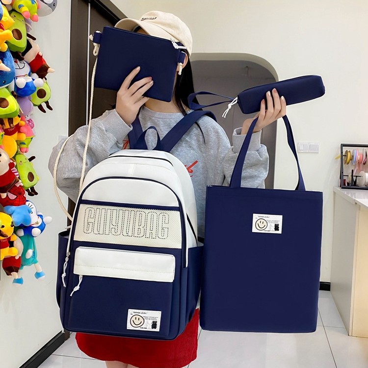 New color-blocking school-style backpack for junior high school students, large-capacity four-piece schoolbag for primary school students, and lightweight commuting backpack Application Scenario