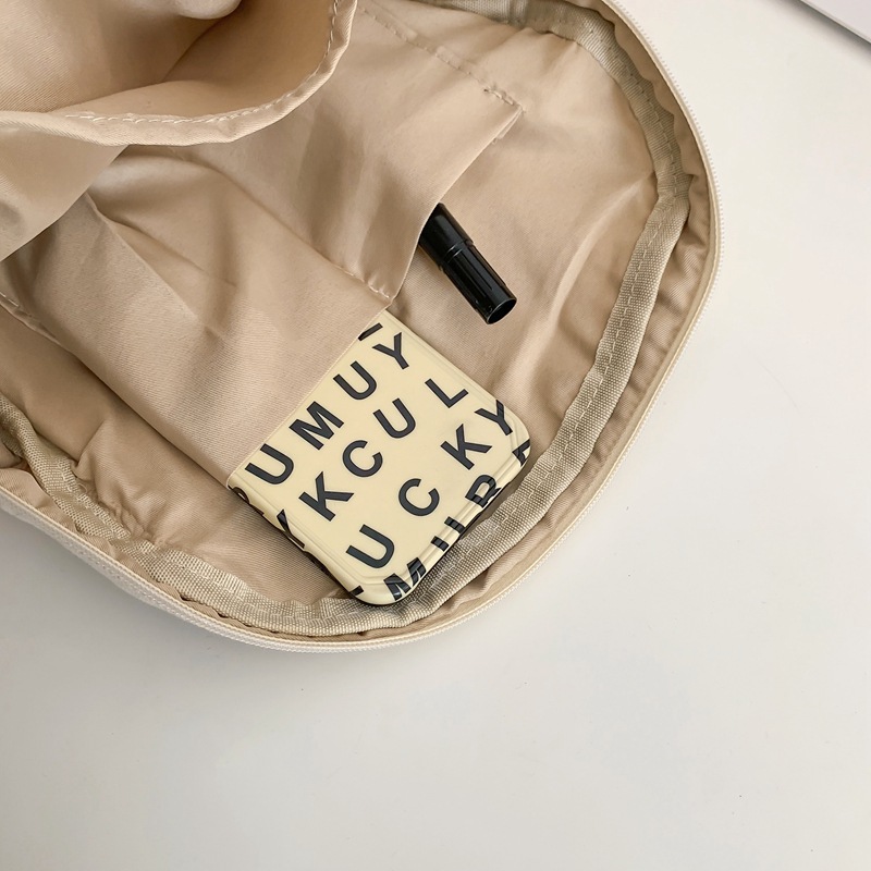 Japanese-style canvas small backpack for women, 2024 new solid color simple small backpack, Korean-style college student travel small bag Application Scenario