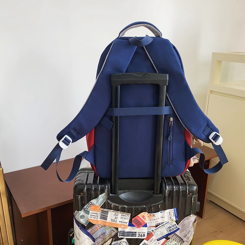 A lightweight and versatile college student backpack, a large-capacity, trendy letter design backpack for women, and a couple's casual backpack for going out Application Scenario