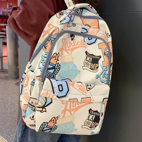 High school student schoolbag, female niche original graffiti travel backpack, large-capacity computer bag, college student casual backpack full figure