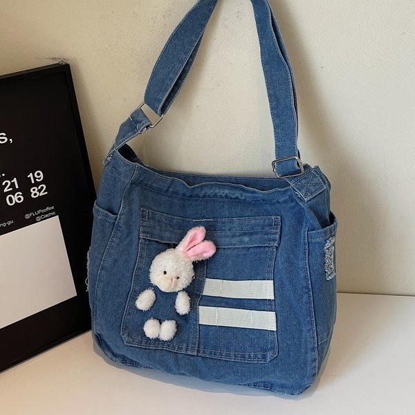 Korean cartoon washed denim bag, single-shoulder crossbody, hand-carry, casual and simple girls' bag, cute student handbag Application Scenario