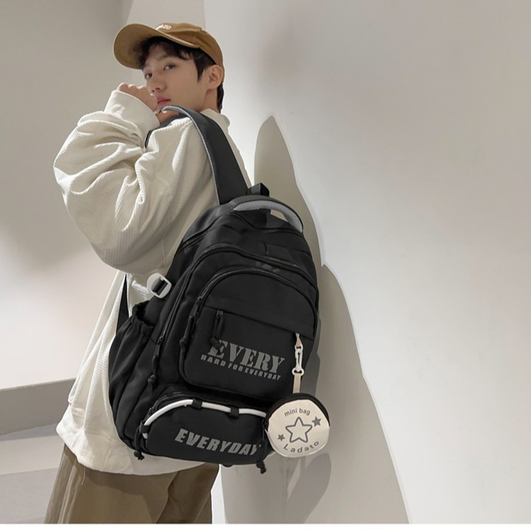 The new Korean-style backpack for middle and high school students is a lightweight and casual backpack with multiple layers and large capacity, suitable for both men and women details Picture