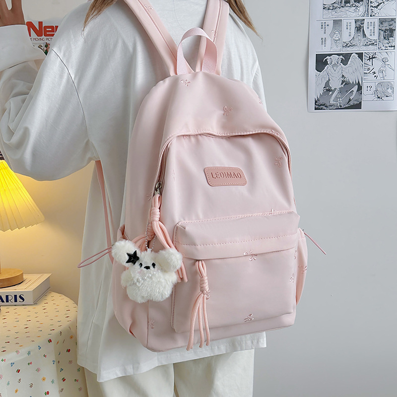 Student solid color schoolbag, high appearance level, new backpack, large capacity, simple, casual and versatile, 2025 details Picture