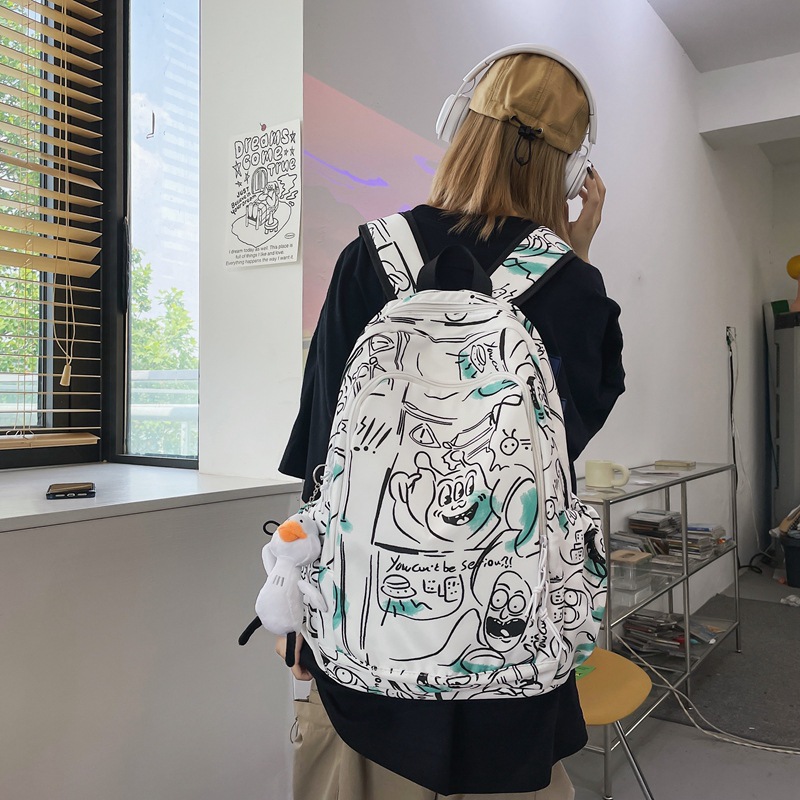 Fashionable graffiti printed schoolbag for girls, cool and trendy ins Japanese Harajuku style backpack, simple college student high school backpack Application Scenario