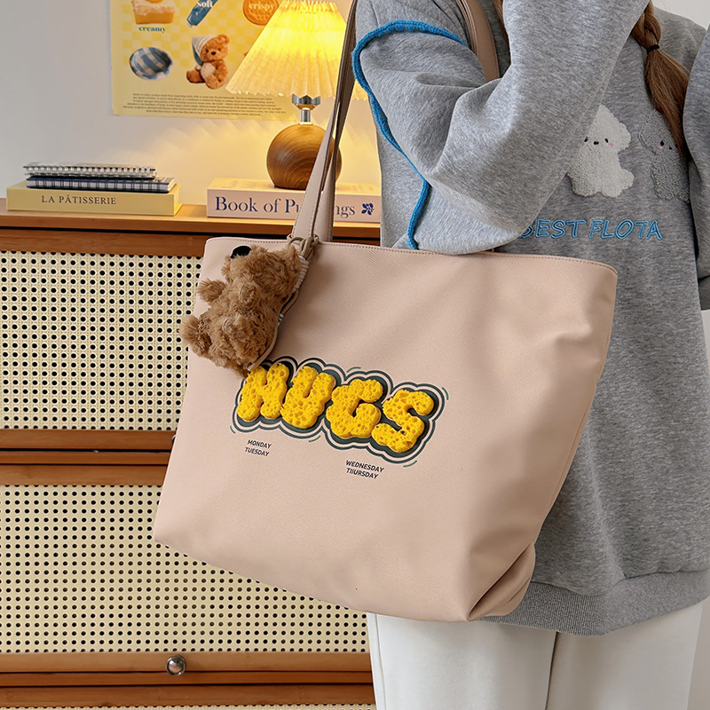 Cross-border trendy pattern letter shopping bag, girl cartoon handbag, cute new student tote bag, single shoulder Application Scenario
