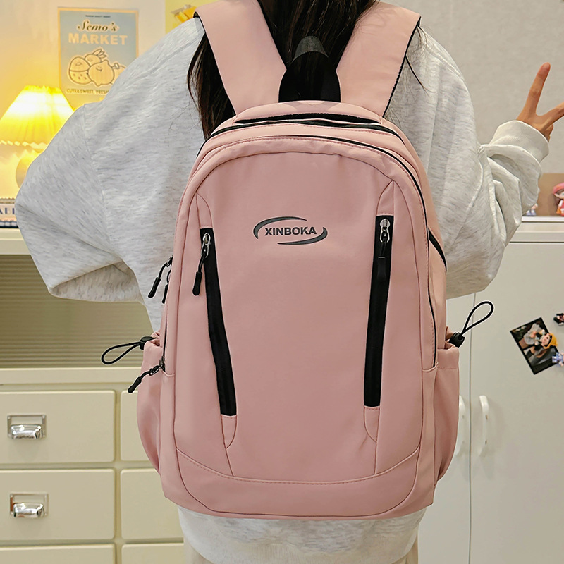 Large-capacity InS-style simple and versatile solid color schoolbag, light and portable couple backpack for junior high school, senior high school and college students' campus style details Picture