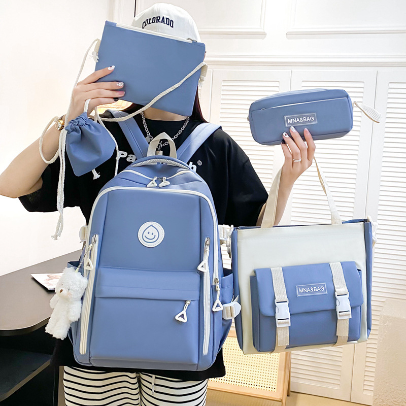 New schoolbag for female primary school students from grades three to six, five-piece set, large-capacity junior high school, dirt-resistant and casual backpack full figure
