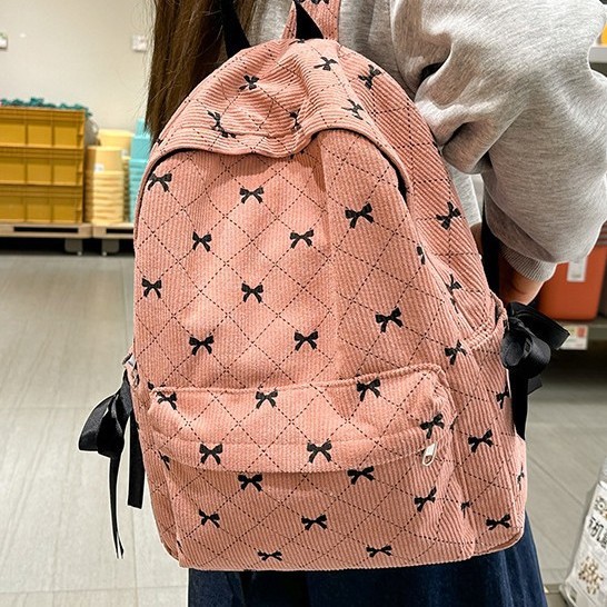 A new and versatile large-capacity student backpack with a fresh bow bow for autumn and winter details Picture
