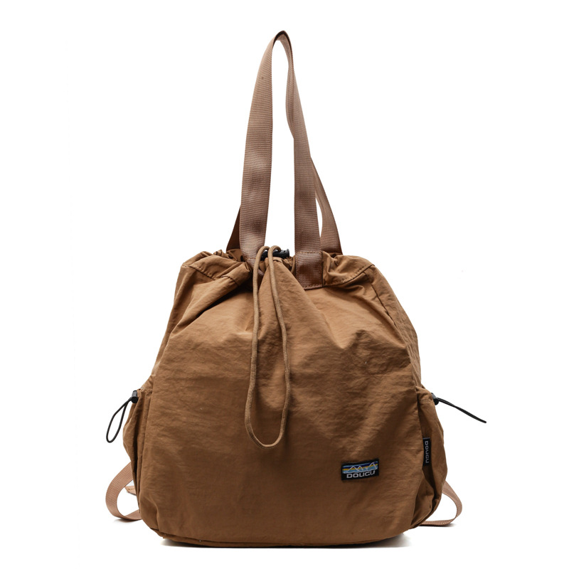 New Spring 2025 tapered casual single-shoulder bag with large capacity, suitable for both men and women, Korean version student backpack Item Picture