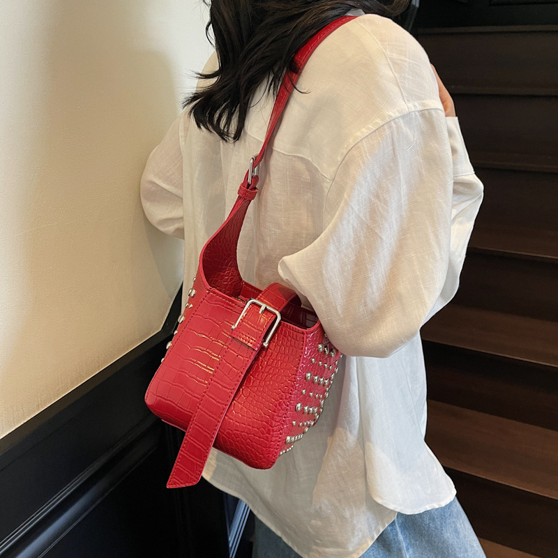 Cross-border versatile bucket bag with rivet design, commuting bag 2025 new style, high-end single-shoulder bag, solid color crossbody bag for women details Picture