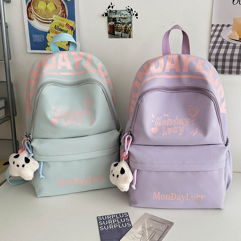 Korean version junior high school backpack, high appearance level, large capacity backpack, light schoolbag, college student letter travel study bag full figure