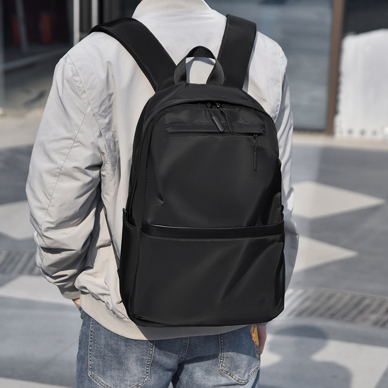 Simple backpack, casual travel bag, large-capacity schoolbag, high school student, male college student, laptop bag full figure