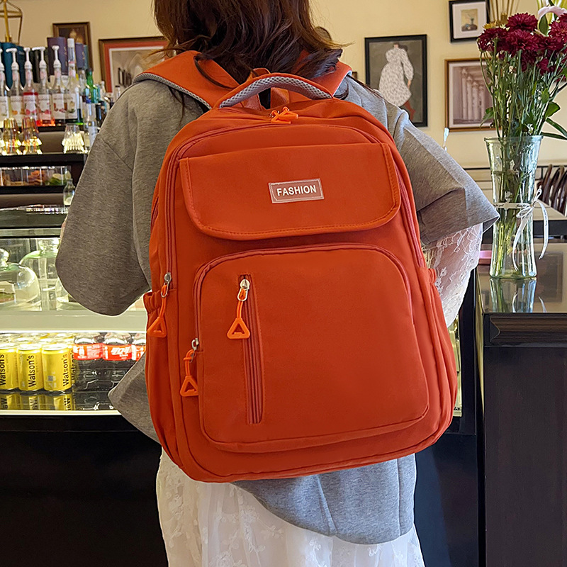Wholesale solid color, simple and large-capacity campus-style backpacks for college and junior high school students to reduce the burden of backpacks details Picture