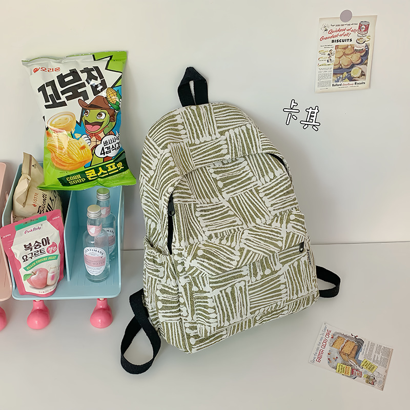 Travel backpack, student schoolbag, striped campus new backpack, niche casual travel, large capacity, trendy color contrast Application Scenario
