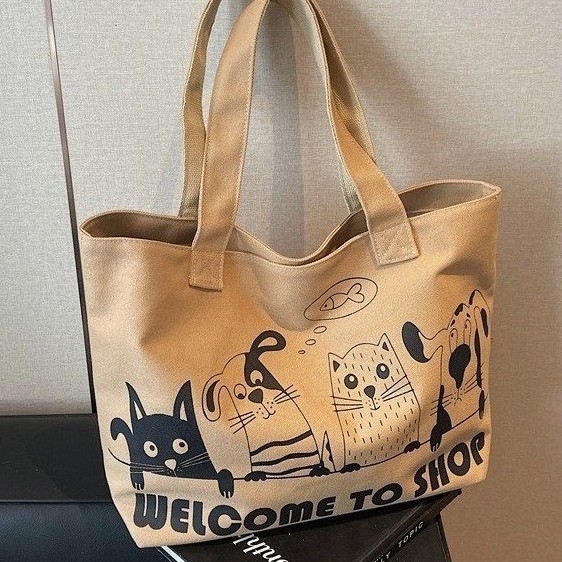 Cartoon casual large-capacity canvas bag for women 2025 new style, lightweight and versatile commuter single-shoulder bag, hand-held tote bag details Picture