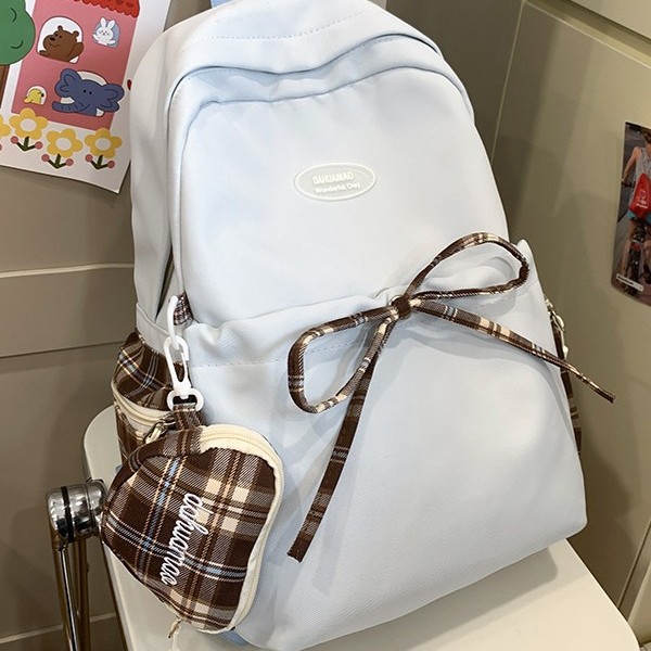 2024 New large-capacity schoolbag, niche design, student lightweight backpack, bow, casual storage backpack details Picture