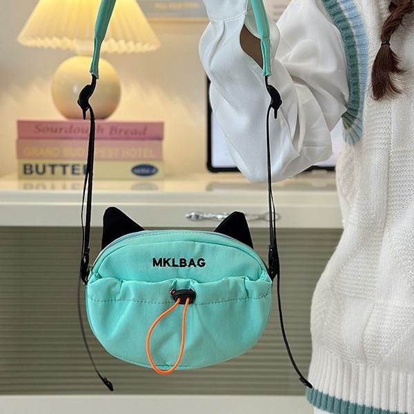 Casual and versatile nylon fabric single-shoulder crossbody bag, new multi-color cat bag, coin purse, mobile phone bag, cartoon crossbody bag Application Scenario