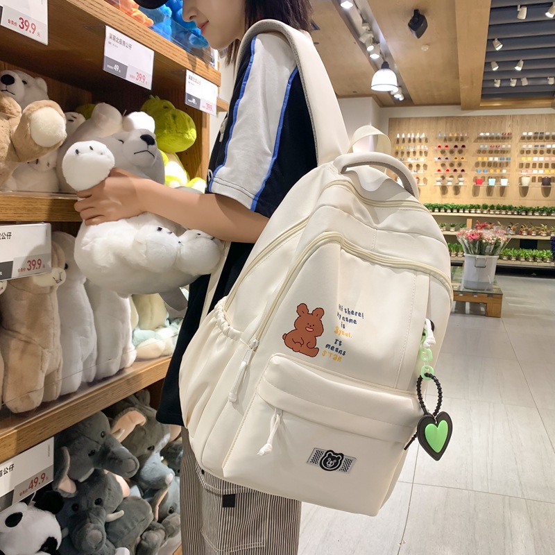 This Japanese-style cute girl backpack is fresh and versatile. It's a casual backpack for going out and has a large capacity. It's a schoolbag for junior high school students on campus details Picture